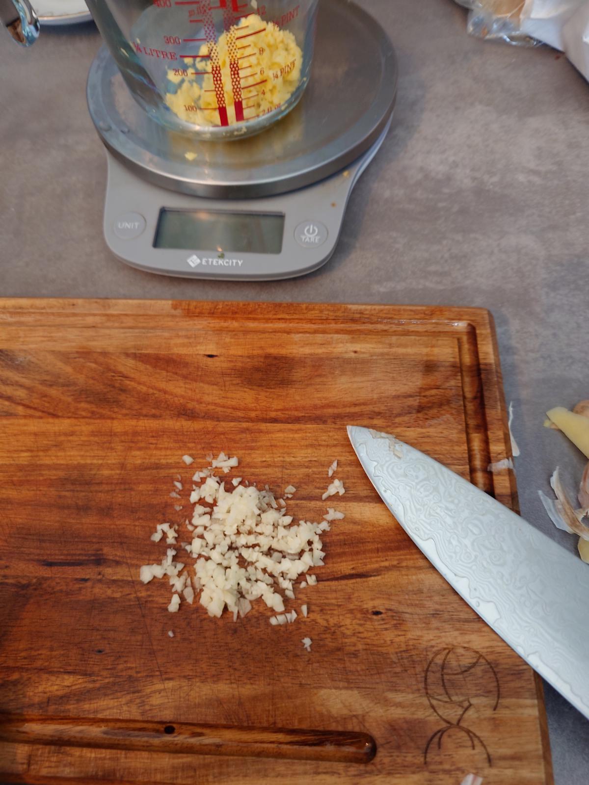 Garlic minced, the ginger already weighed into the measuring cup