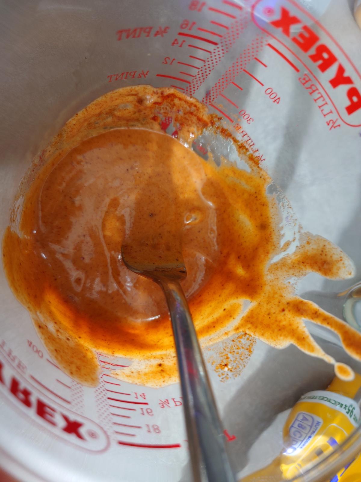 Whisked to a smooth orange sauce