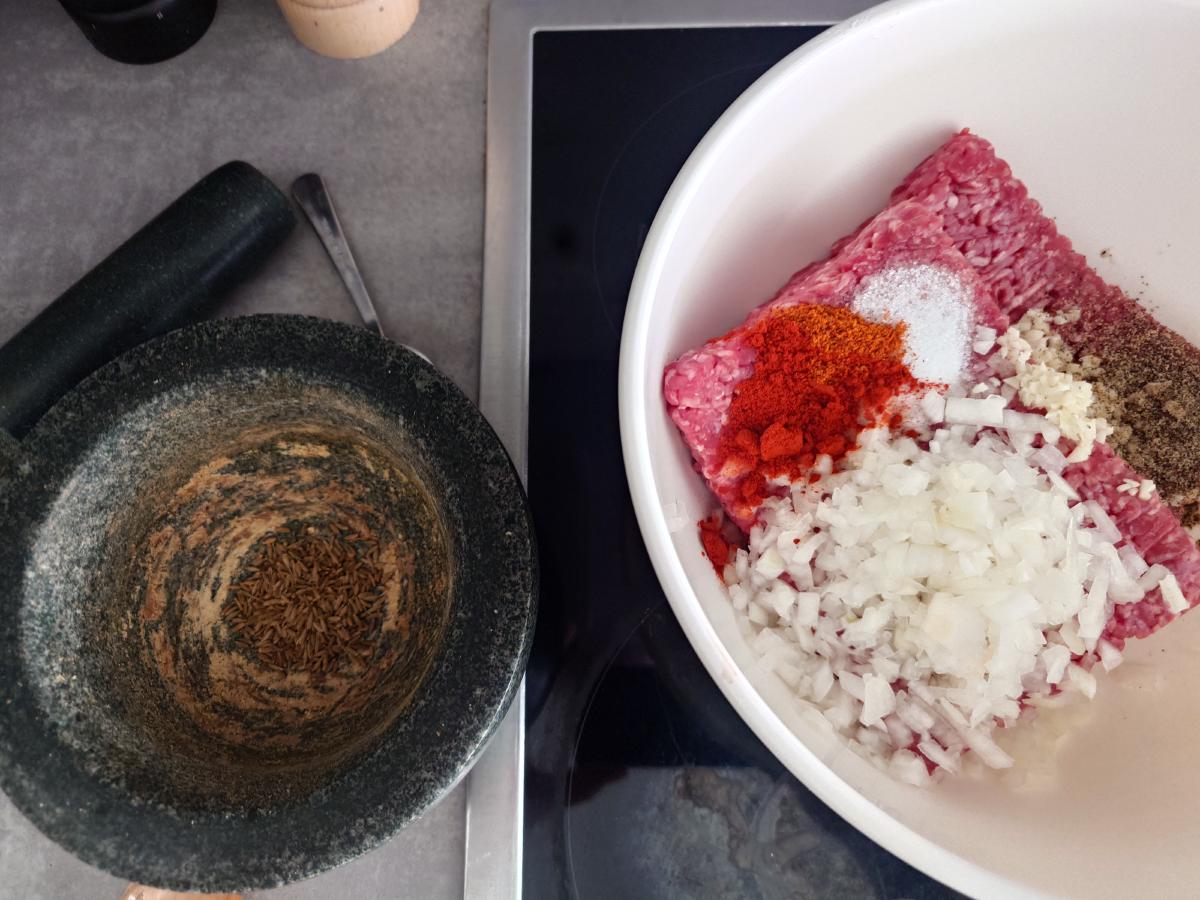 Everything in the bowl, cumin ground in the mortar alongside