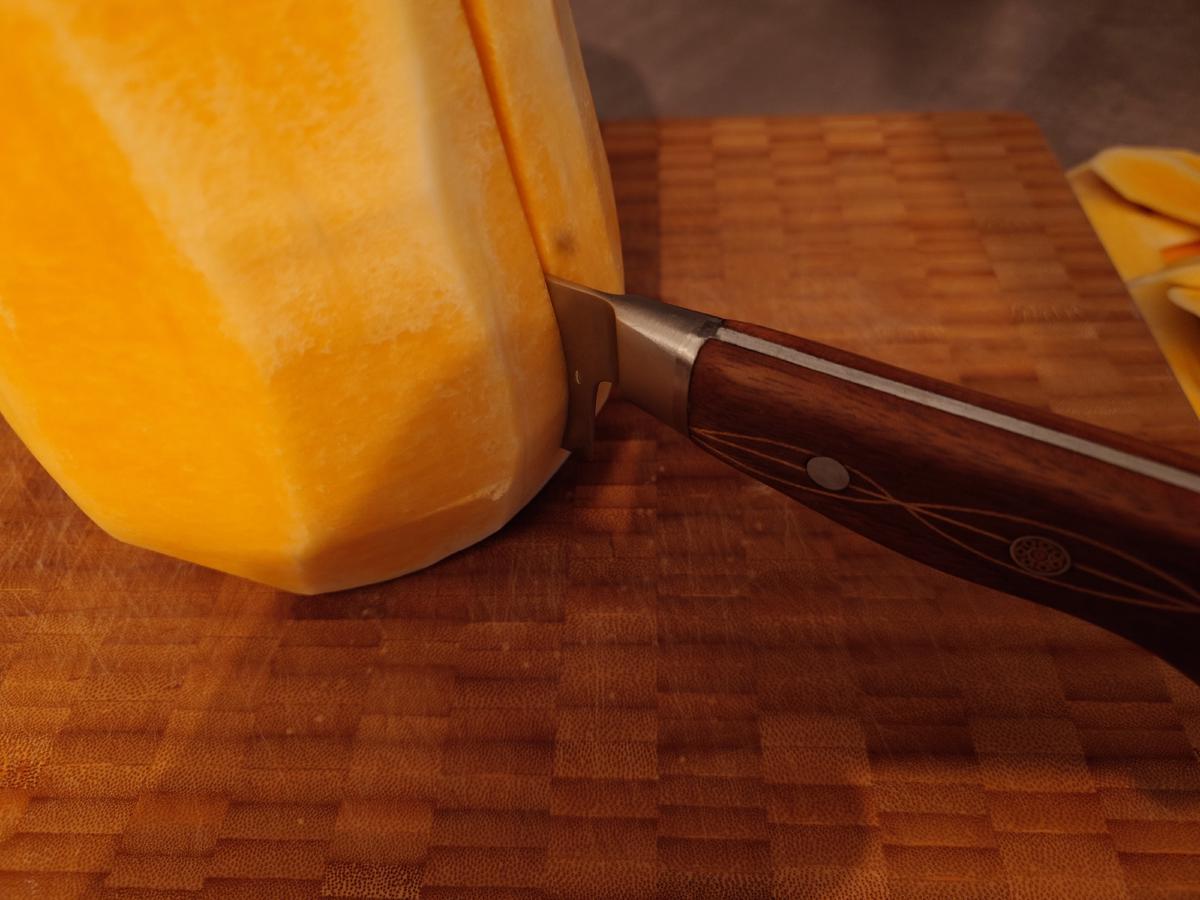 A peeled section on the board, peel piled at the back