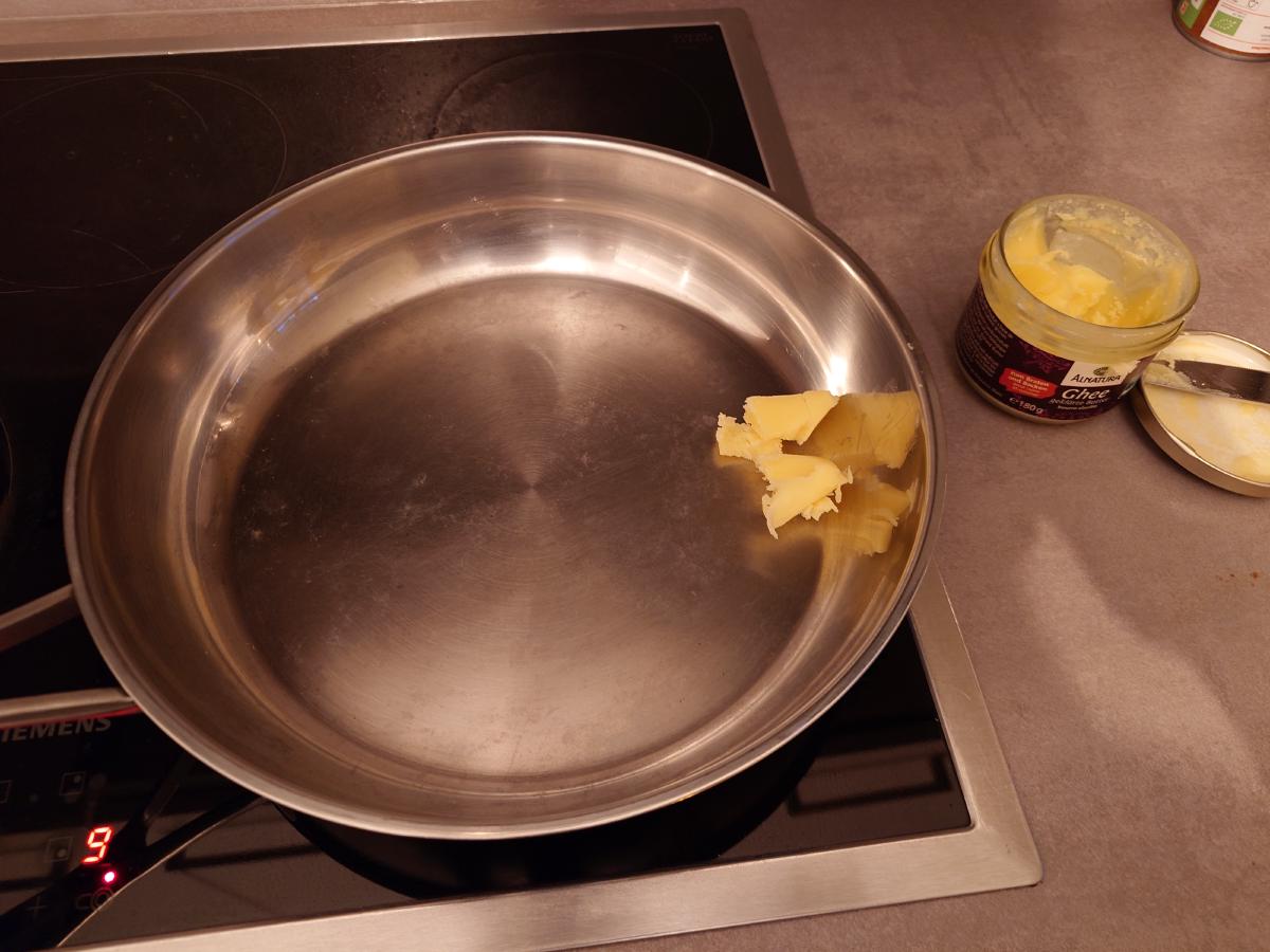 Ghee melting in the steel pan, dial reading 9