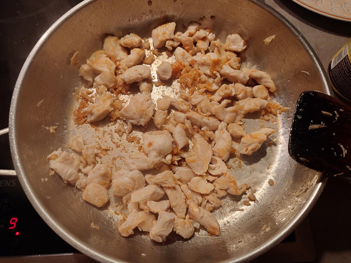 The same batch coloured, browned scraps stuck to the pan