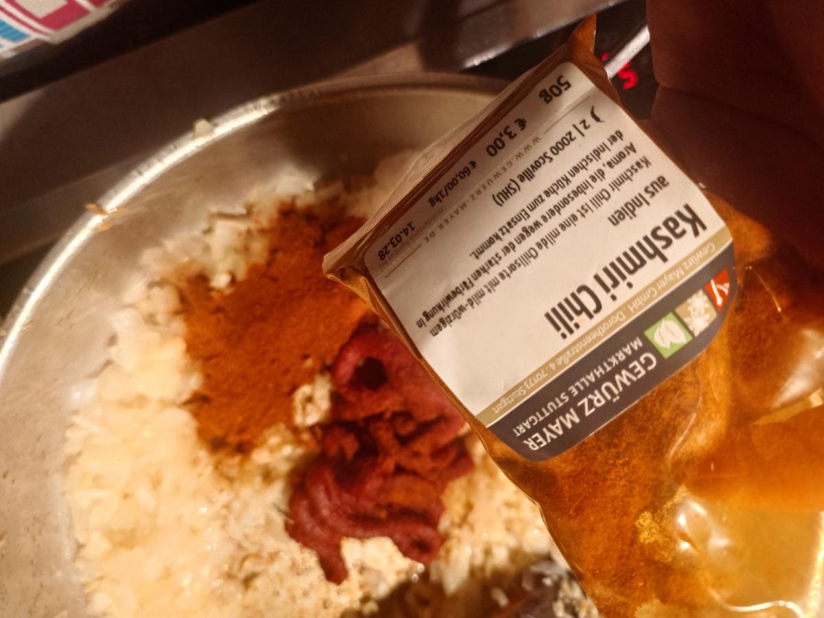 Kashmiri chili powder shaken in from the bag