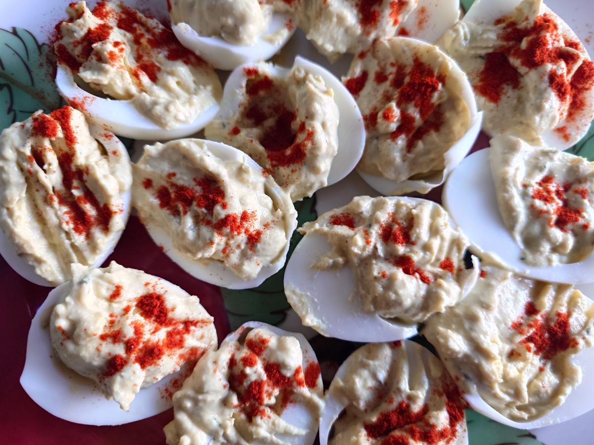 The finished deviled eggs dusted with paprika
