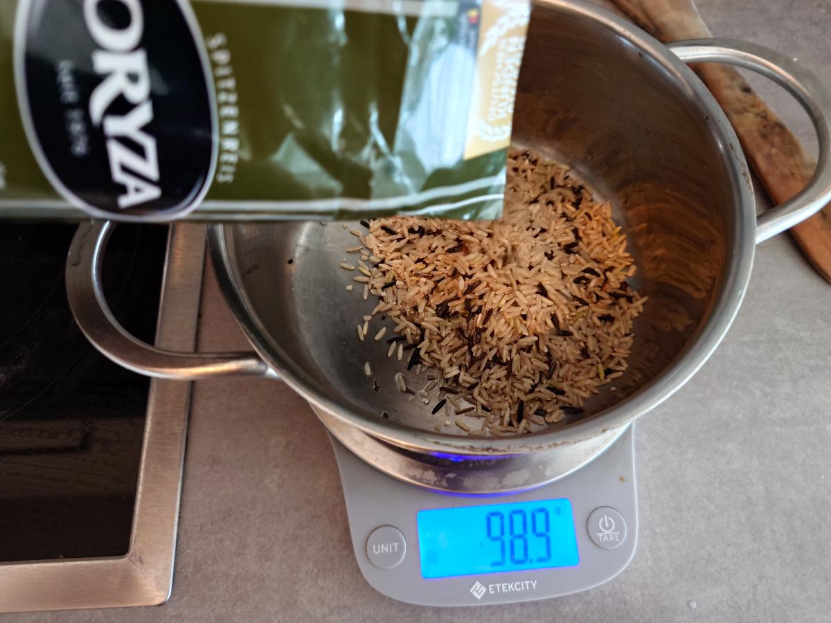 Wild rice blend poured into the pot