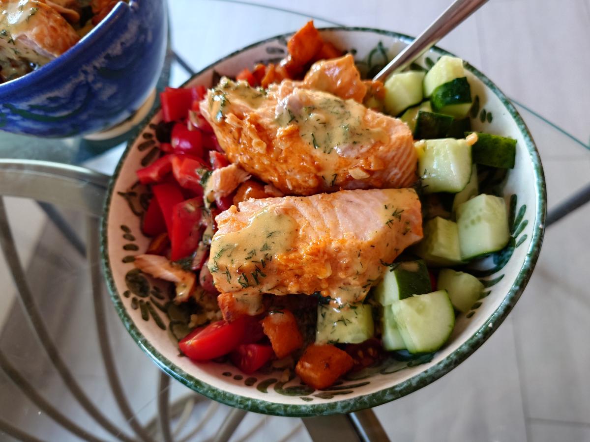 The finished bowl, salmon over rice with cucumber, pepper and sweet potato