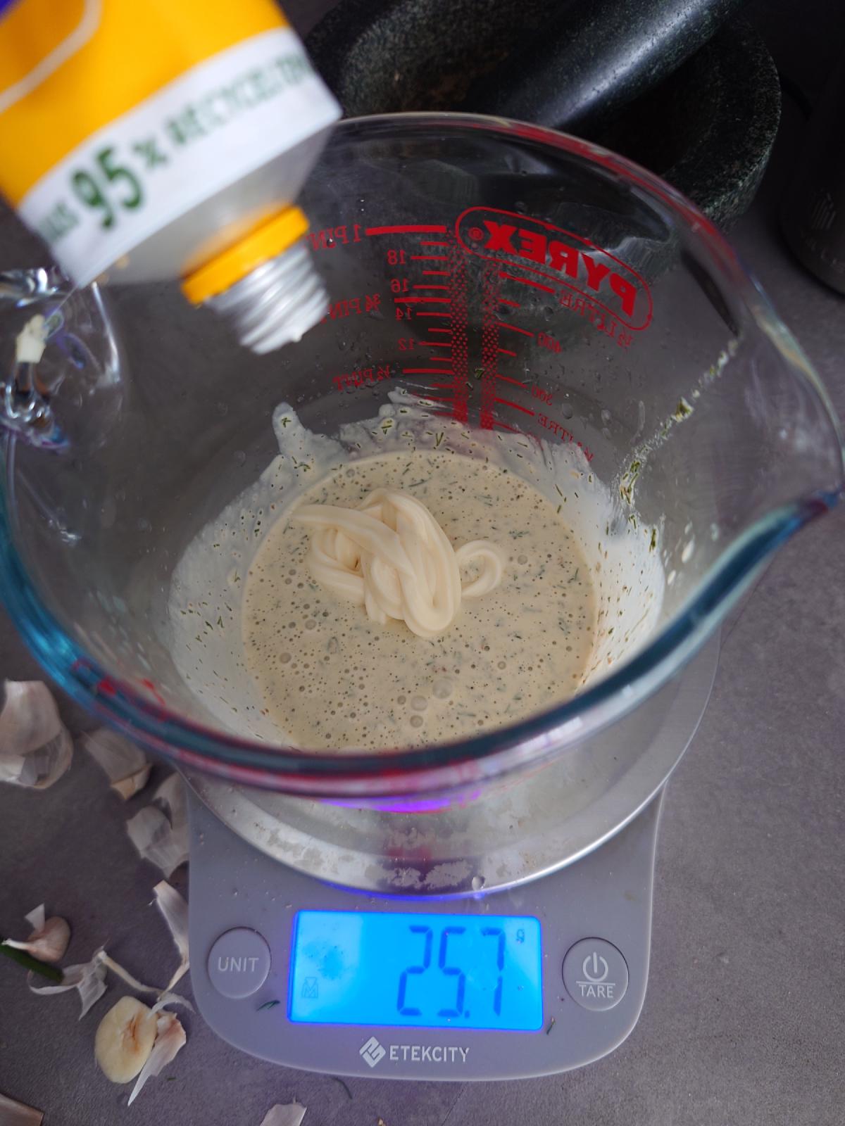 More mayonnaise squeezed into the thinned sauce