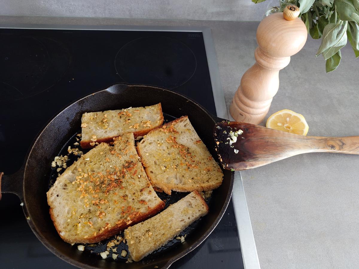 Flipped and topped with the garlic, herbs and zest