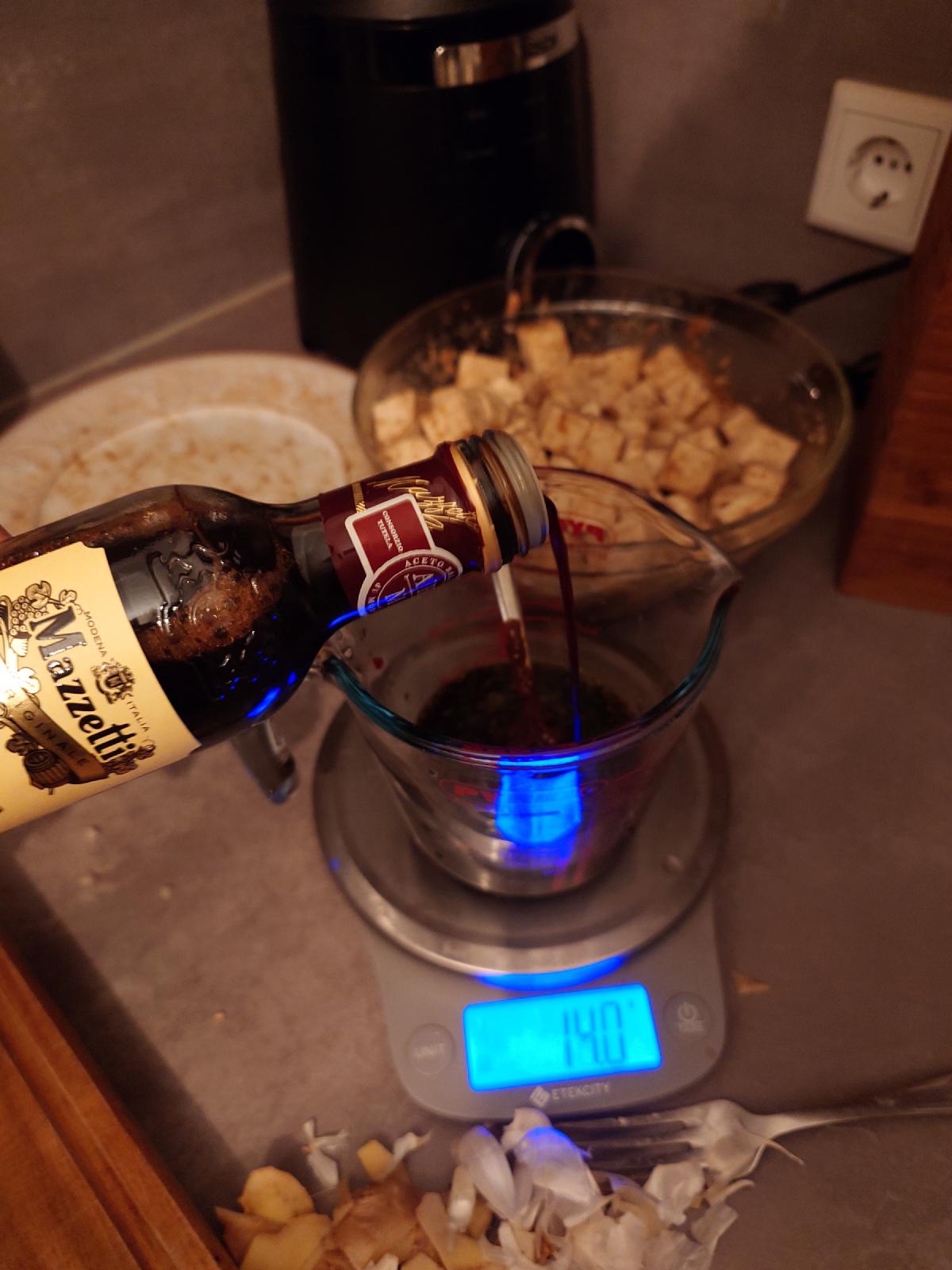 Balsamic poured in, the scale reading 14.0