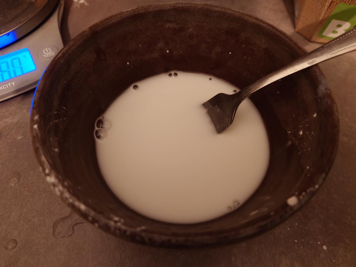 The slurry whisked, milky and thin