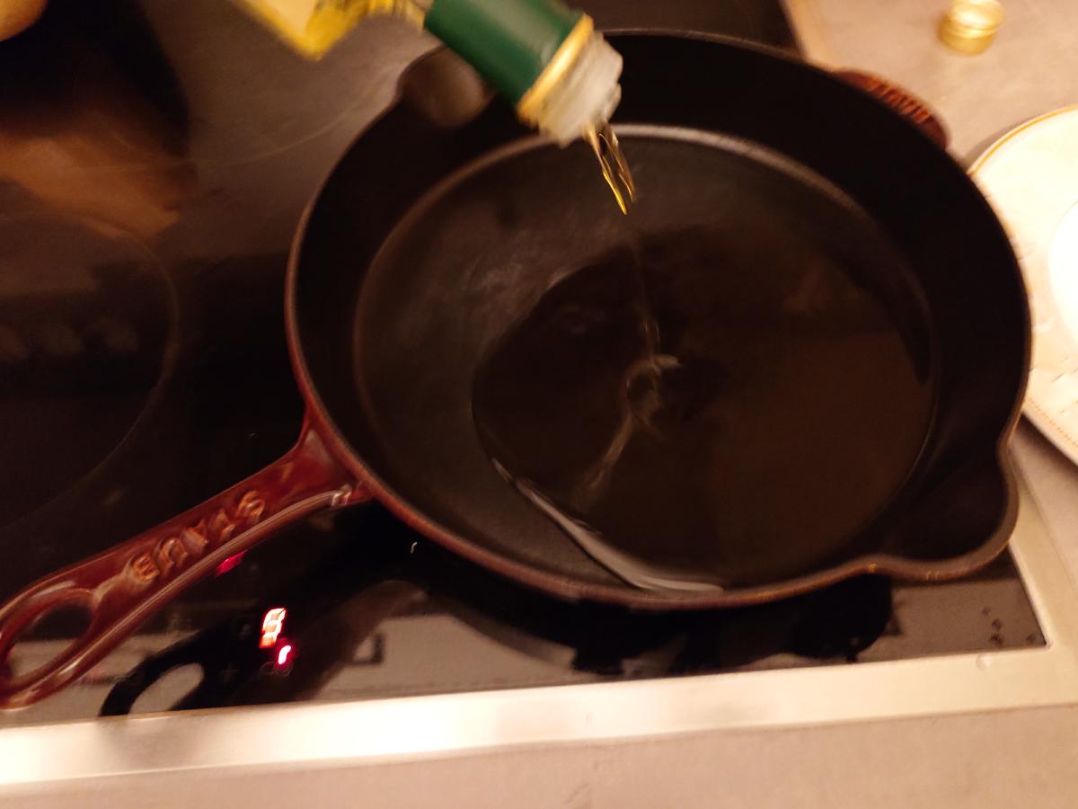 Oil poured into the hot pan