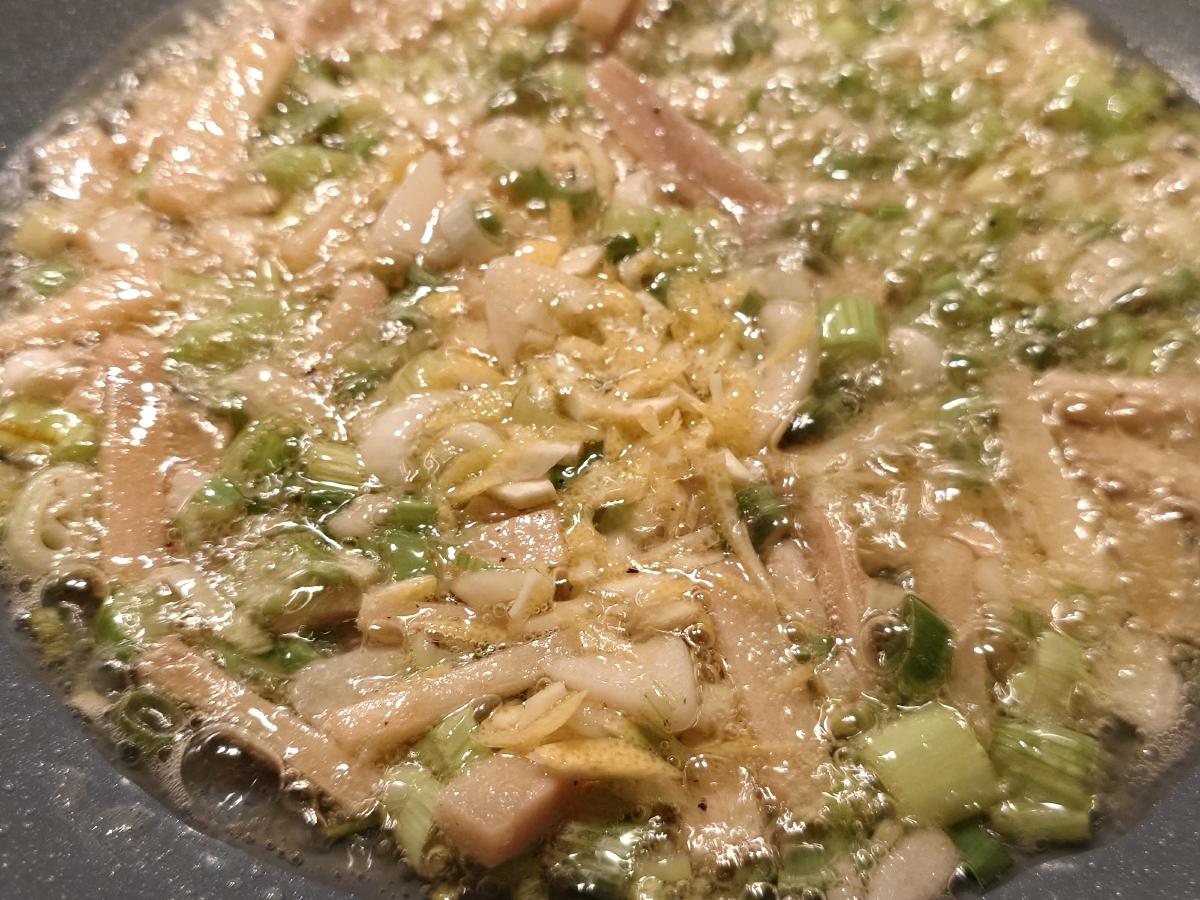 The chopped zest stirred through the aromatics
