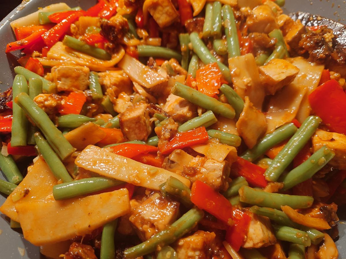 The finished stir fry, everything glossy and clinging