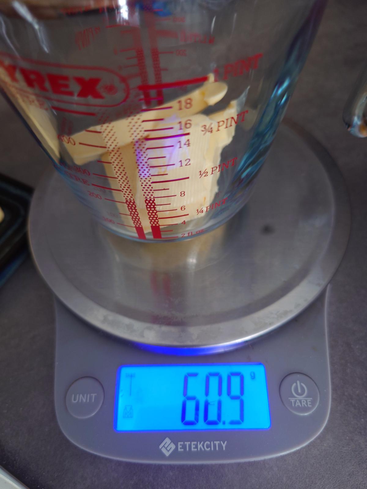 Butter in the Pyrex measuring jug on the scale, 60.9 g