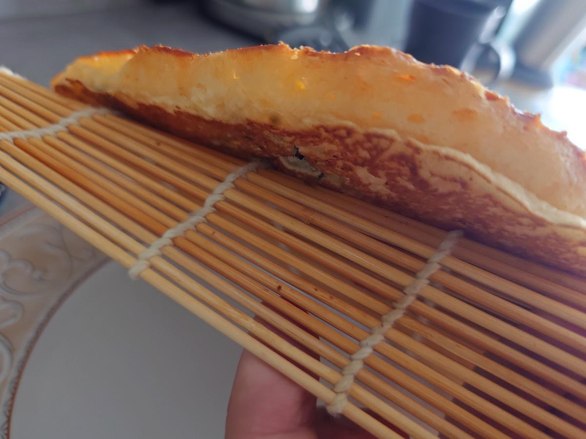 The first pancake seen edge-on, standing tall on the mat
