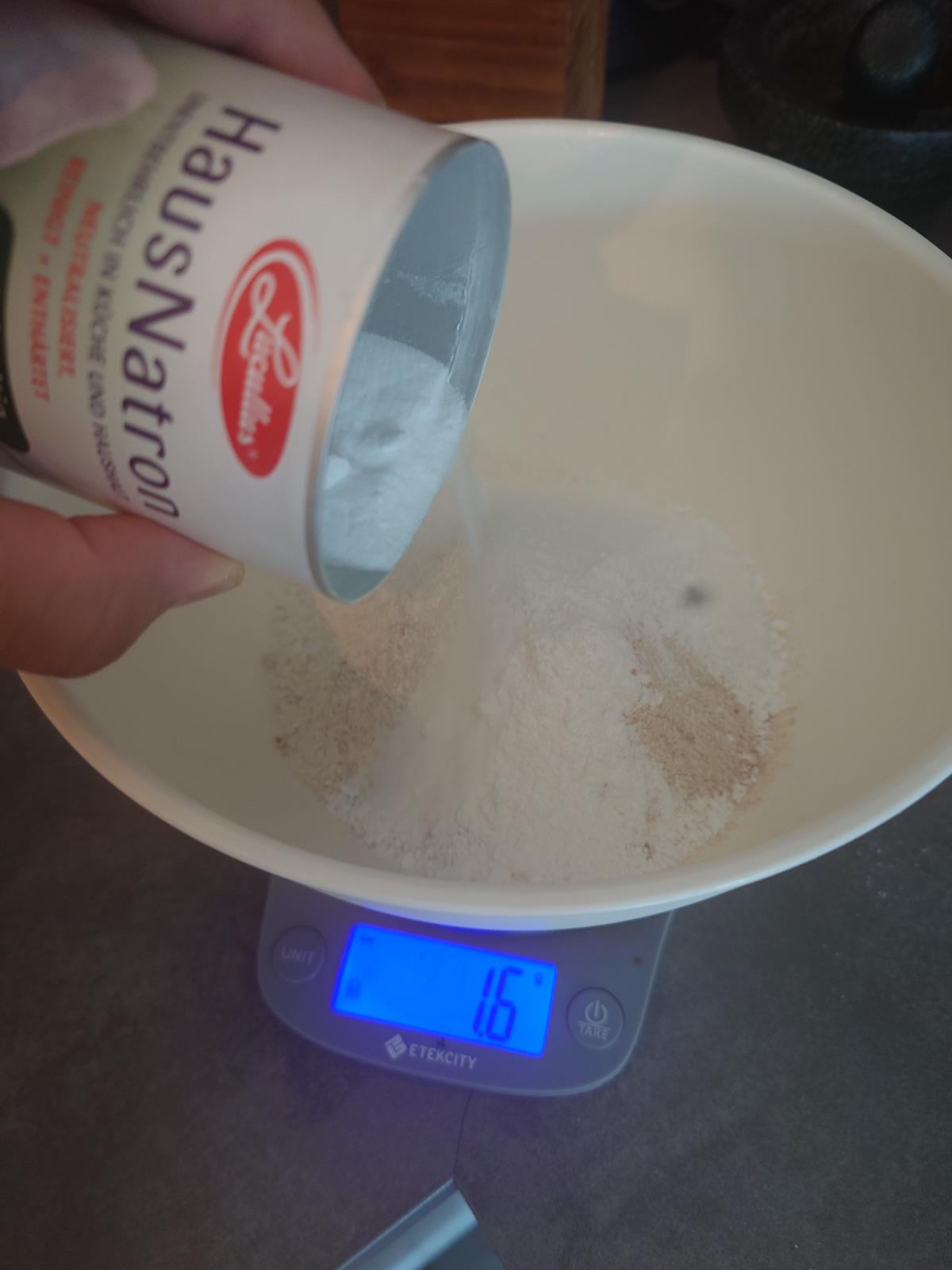 Baking soda tipped in from the tin