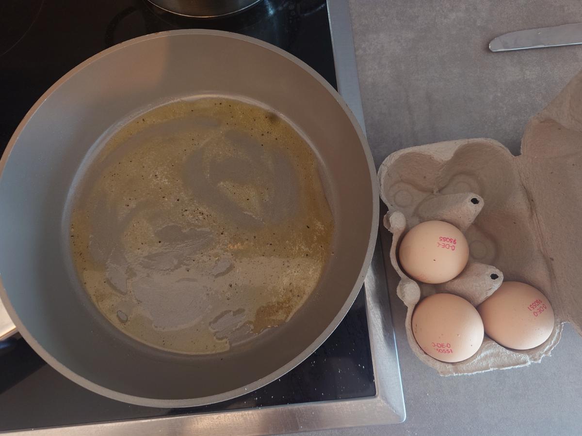 Butter melted and foaming across the base of the pan