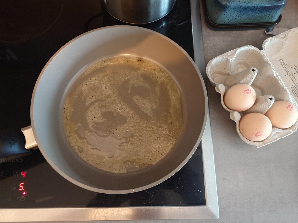 Seasoned butter melted smooth across the pan