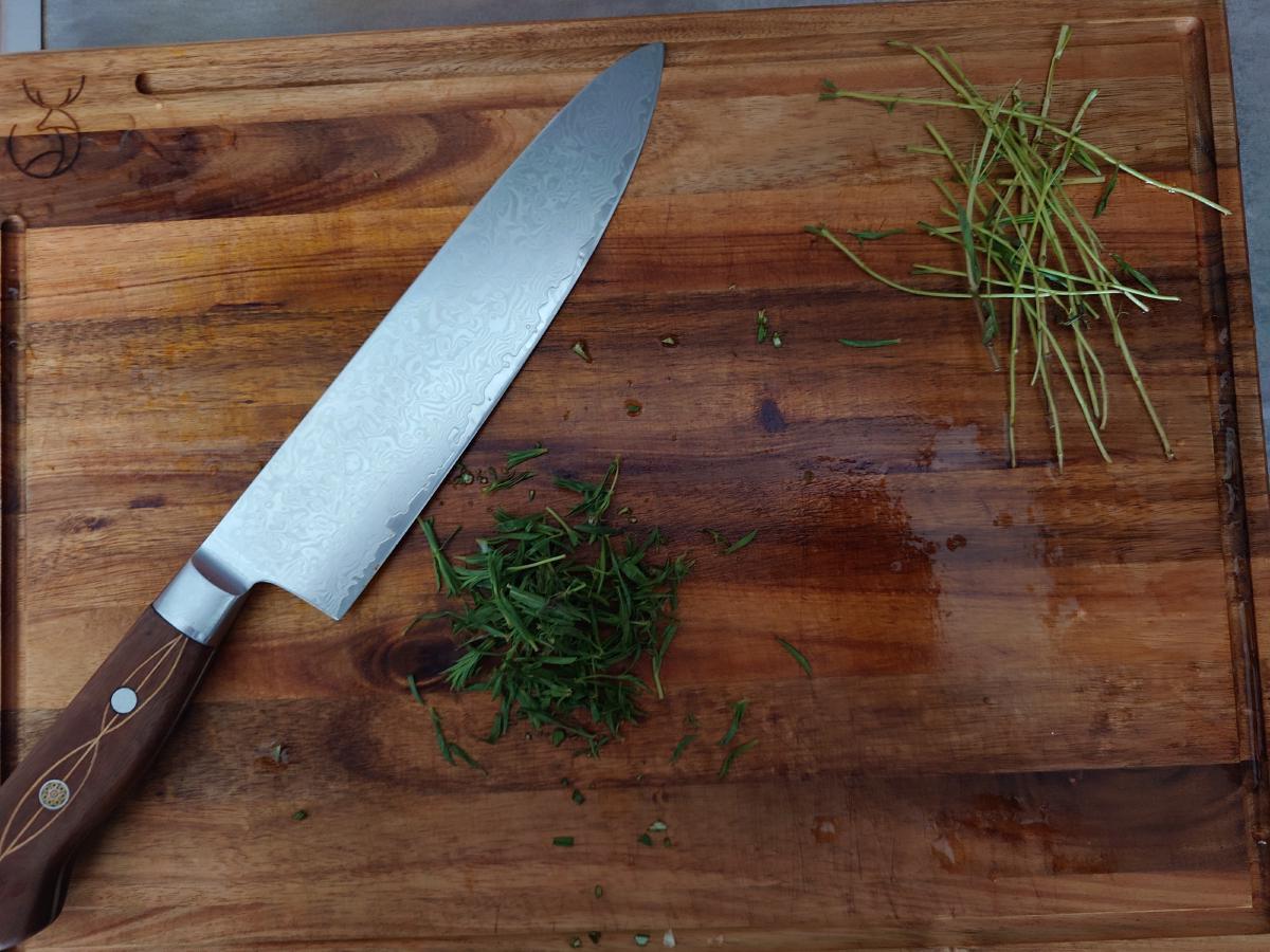 Oregano leaves stripped, stems set aside