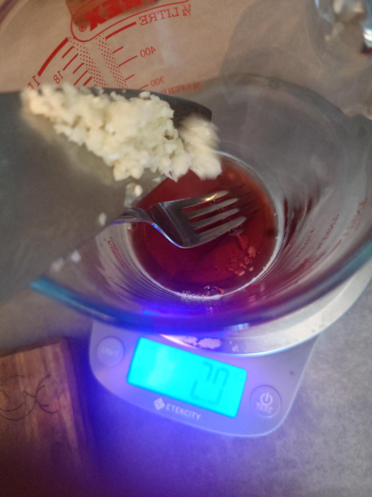 Minced garlic added off the knife