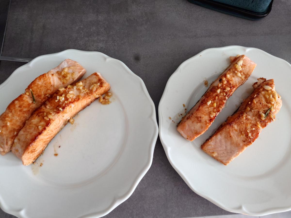 Salmon divided onto two plates