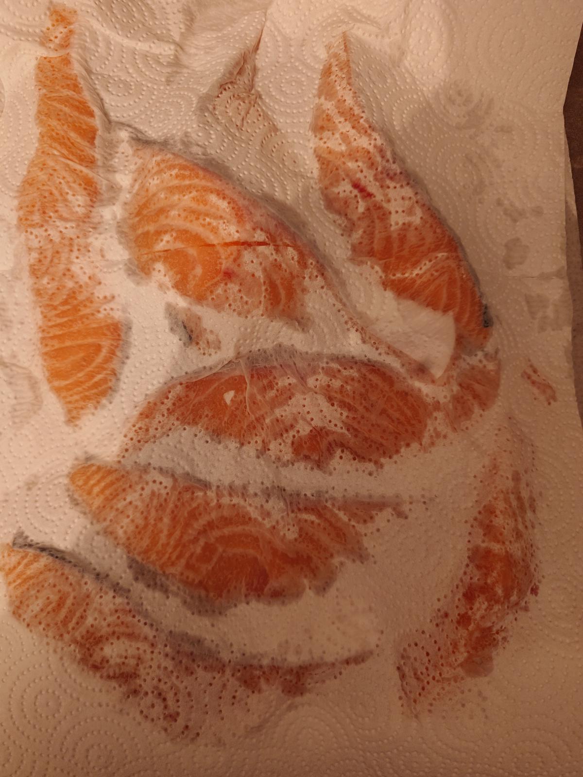 The fillets patted dry on paper towel