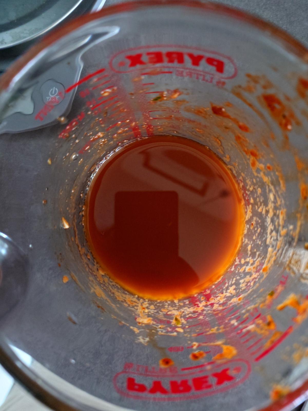 The dressing sitting in two layers, oil clear on top