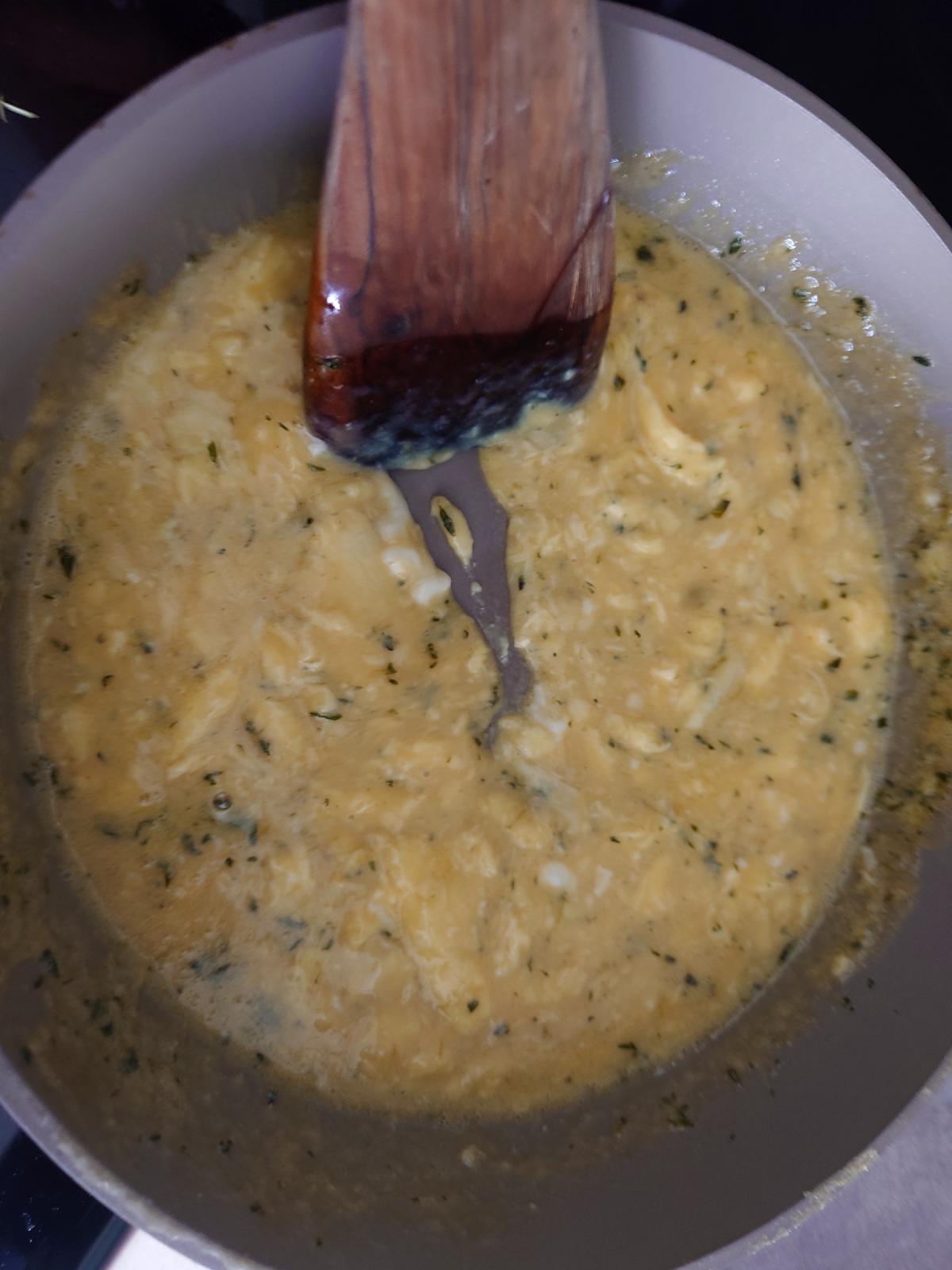 Curds thickening under the spatula
