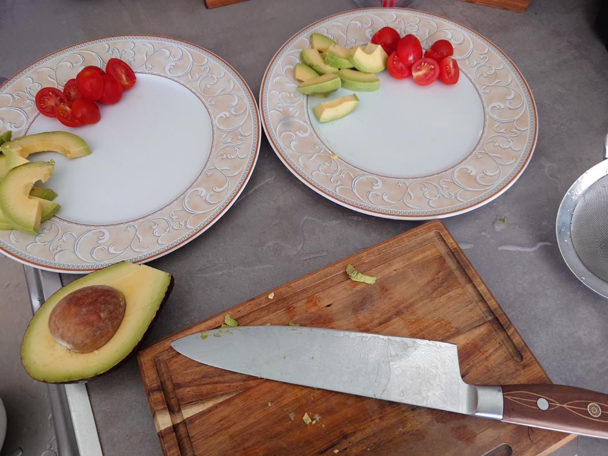 Avocado and tomatoes plated
