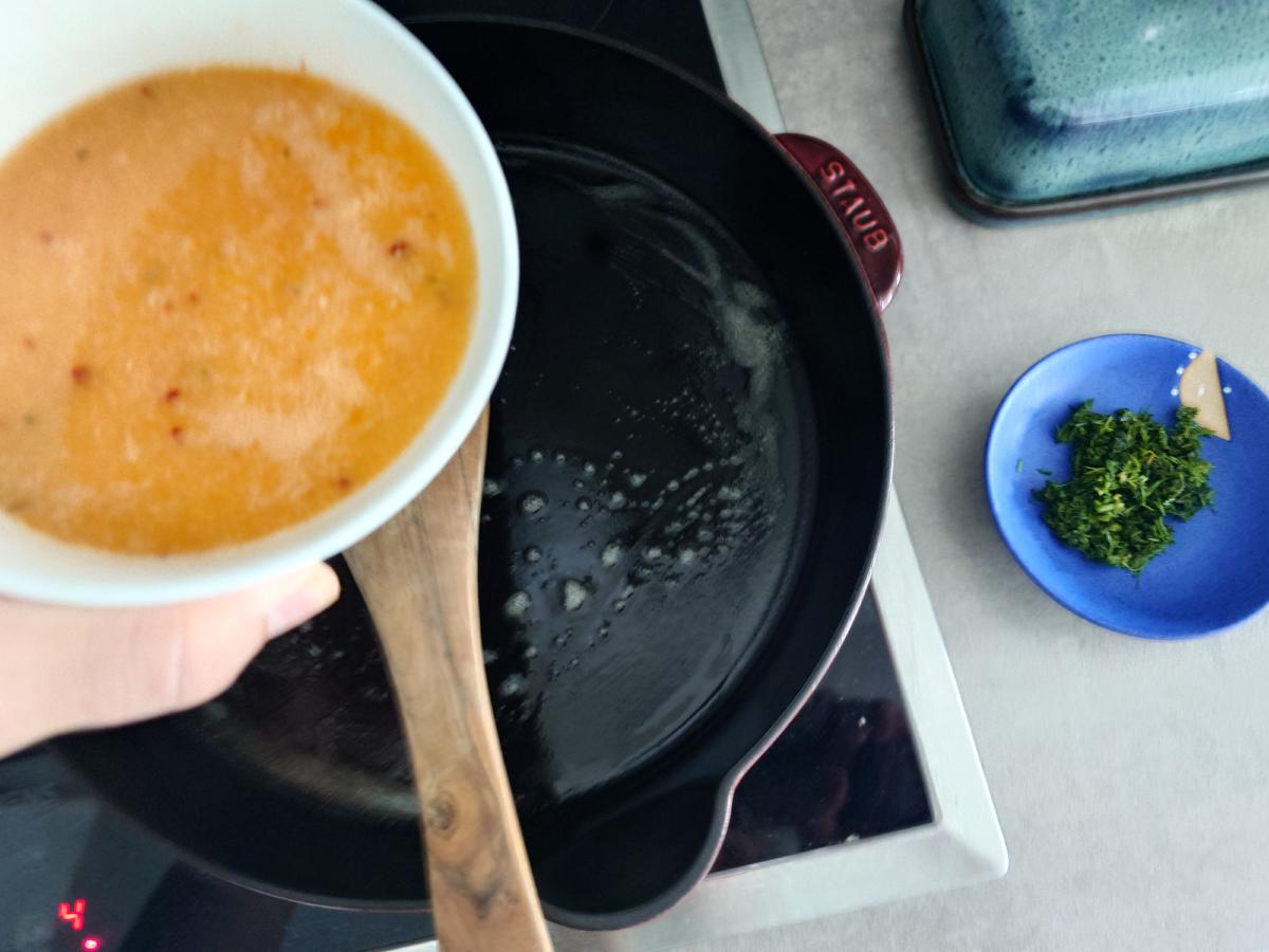 Egg mixture poured into the pan