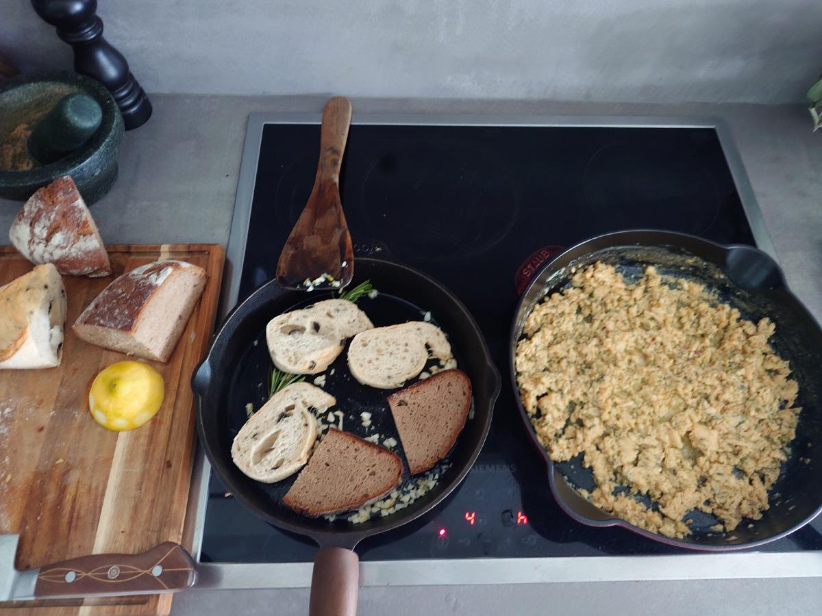 Bread frying with rosemary and garlic