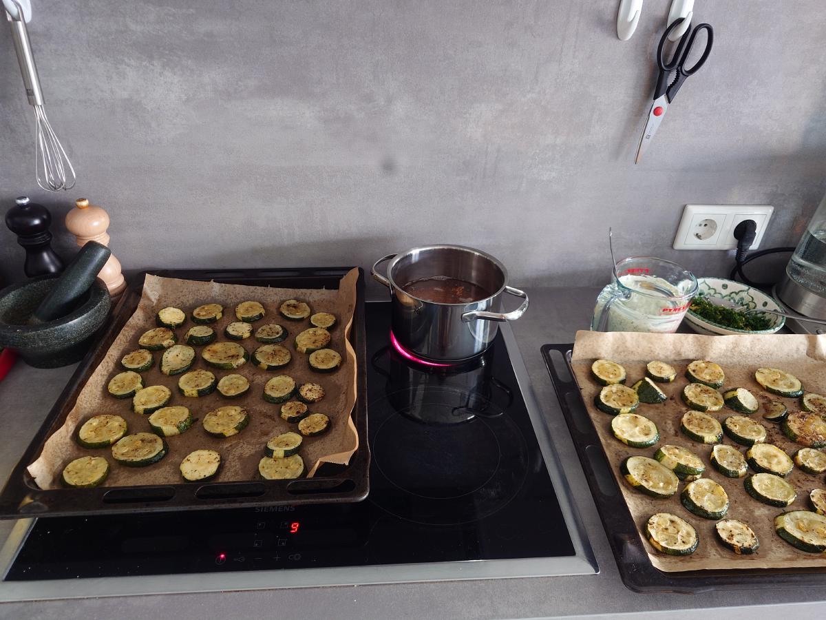 Both trays of roasted rounds out on the counter, the buckwheat pot boiling on 9