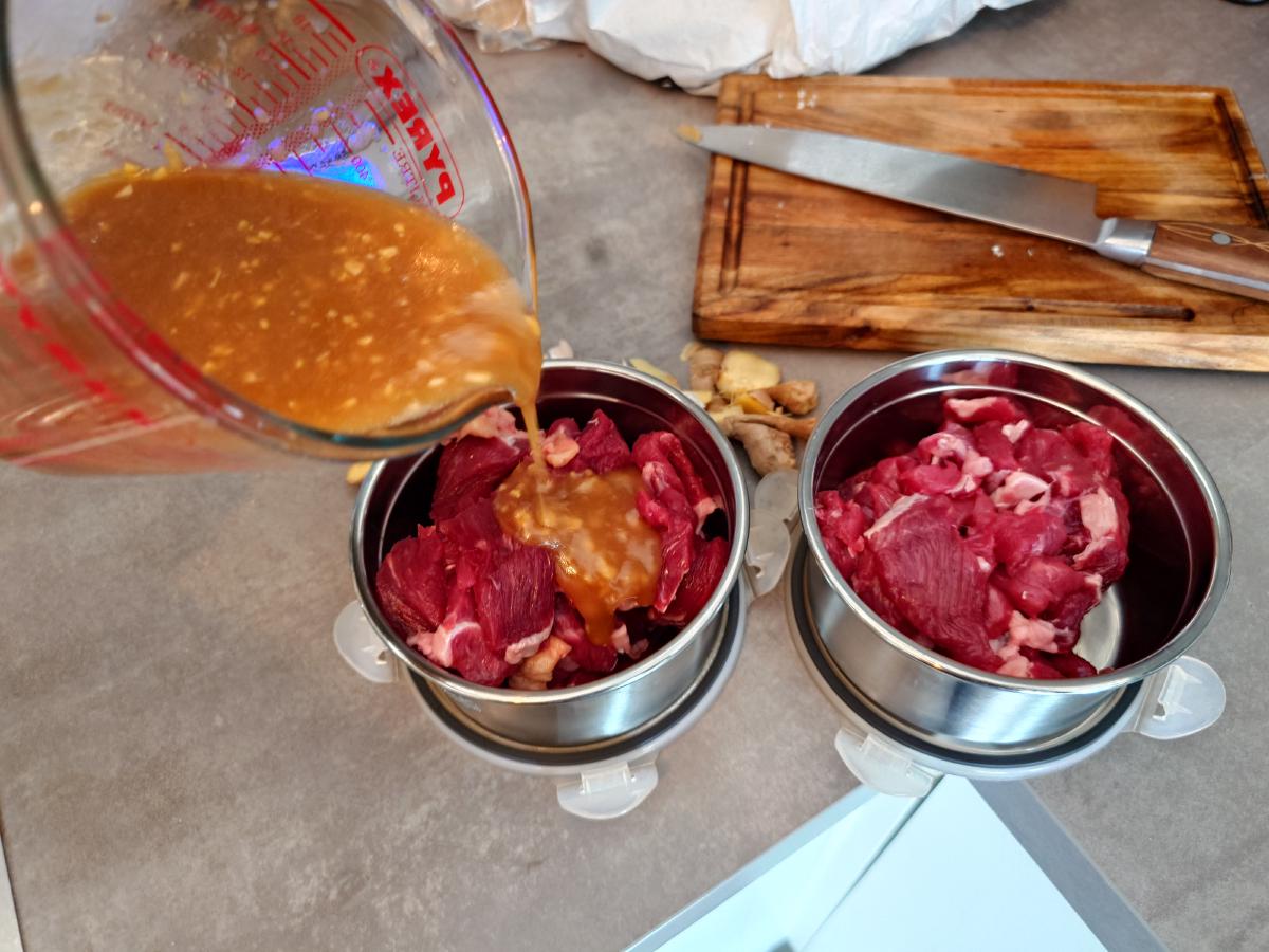 Marinade poured over the sliced beef